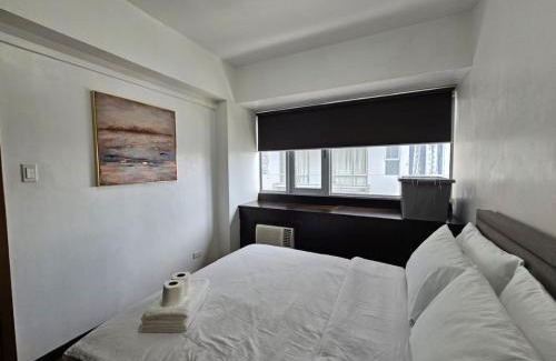 Pasig Apartamento | Sunshine 100 Plaza - Bright and cozy 1 bedroom with washer