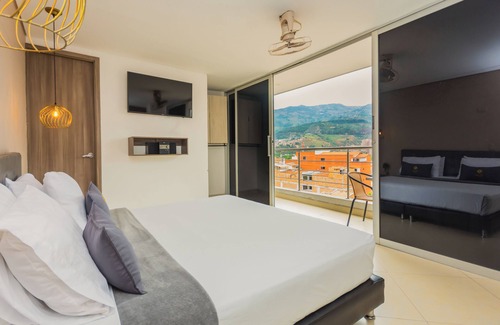 Bello Hotel | Hermosa Habitación con vista a la ciudad en bello