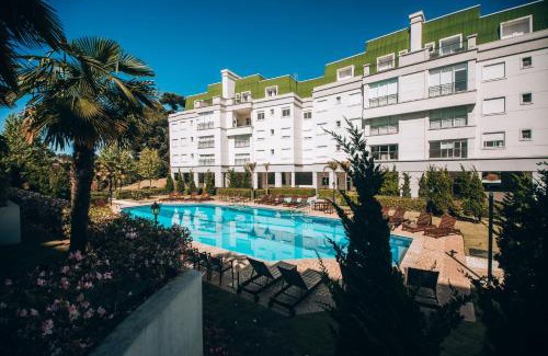 Vila Inglesa Apartamento | Superitá Campos do Jordão - Apto de alto padrão com estrutura de resort perto do Capivari e Morro do Elefante