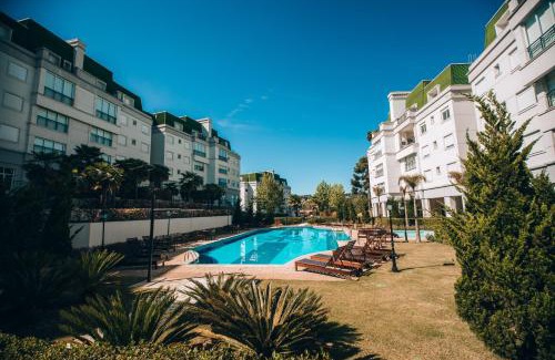 Vila Inglesa Apartamento | Superitá Campos do Jordão - Apto de alto padrão com estrutura de resort perto do Capivari e Morro do Elefante