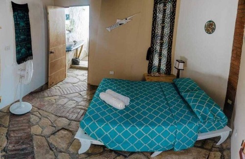 Las Penitas Apartamento | Habitación Matrimonial Surf: descanso y naturaleza cerca de la playa