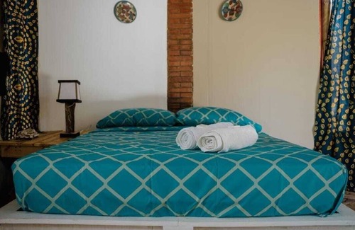 Las Penitas Apartamento | Habitación Matrimonial Surf: descanso y naturaleza cerca de la playa