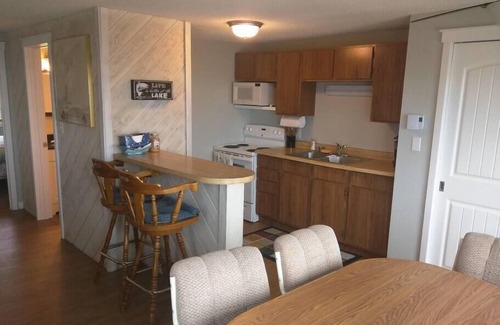 Oscoda Casa | Dos dormitorios, totalmente amueblado frente a la playa cabaña en el lago Huron