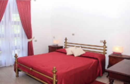 Elpitiya Cama Y Desayuno | Surrounded by lush greenery, offers homely and comfortable accommodation.