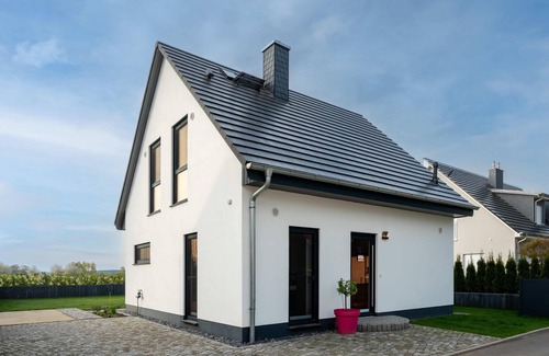 Muritz Casa | Sustainable Duncan House with fireplace, 3 bedrooms with en-suite bathroom