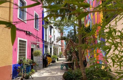 Churubusco Casa | Sustainable Home - Casa Vecindad Murals
