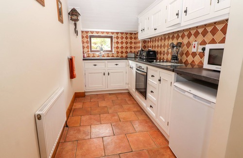 MacGillycuddy's Reeks Cabaña | SWEENEY'S COTTAGE, family friendly in Beaufort, County Kerry
