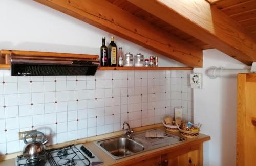 Songavazzo Casa | Sweet Home Casa Vacanze "La Mansarda"