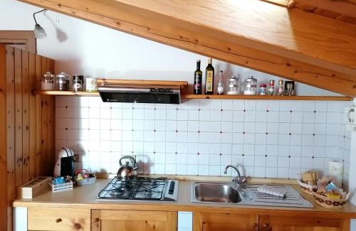 Songavazzo Casa | Sweet Home Casa Vacanze "La Mansarda"