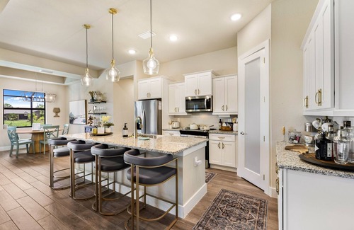 Punta Gorda Casa | Swim Sun Relax 4BR {1-K 3-Q} 2BA with Heated Saltwater Pool