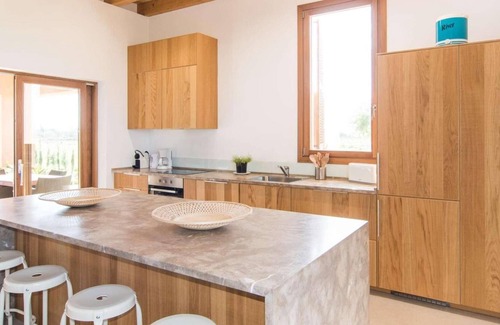 Es Palmer Villa | symbiosis of old and new buildings