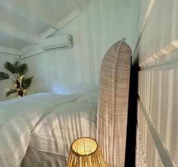 Bas du Fort Apartamento | T2 cosy avec mezzanine, piscine & plage à pied