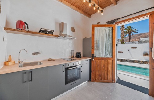 Tabayesco Apartamento | Vacaciones 'Tabayesco' con vistas a la montaña, piscina compartida y Wi-Fi