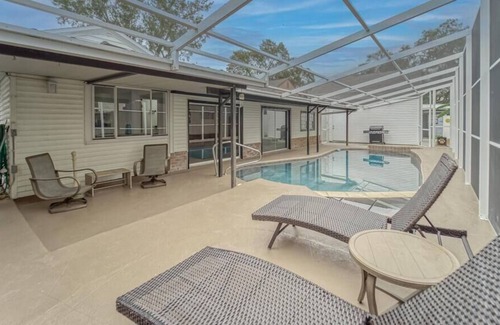 Riverside Heights Casa | Tampa Retreat: Poolside & Spa Fun and City Vibes