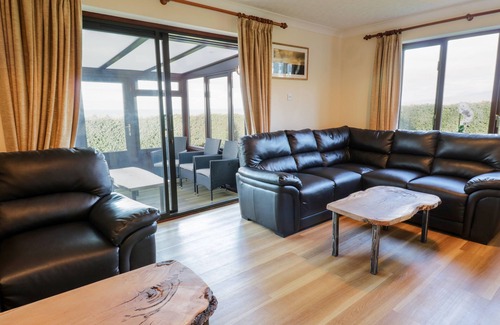 Llwyngwril Cabaña | TAN Y FEDWEN, admite mascotas, con un jardín en Llwyngwril, Ref 996506