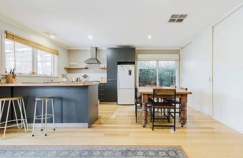 Kensington Casa | Tangerine Gleam Cheerful Inner City Family Abode