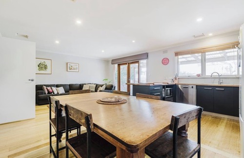 Kensington Casa | Tangerine Gleam Cheerful Inner City Family Abode