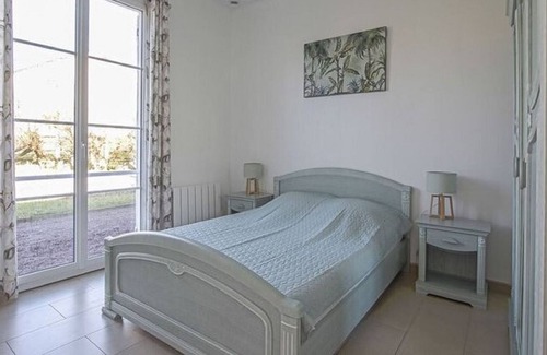 Sainte-Honorine-des-Pertes Casa | Elegante casa de vacaciones en Aure sur Mer con jardín