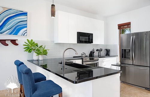 Providenciales Casa | Water Edge Villa en Grace Bay Beach, una escapada romántica a las Islas Turcas y Caicos