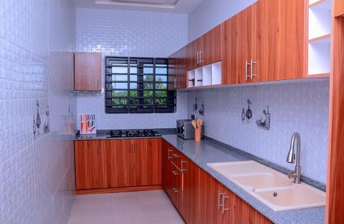 Ouidah Apartamento | TCHETINMEY GUEST HOUSE & Tours