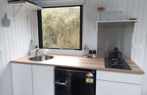 Shannon Casa | Te Paki Dam View by Tiny Away