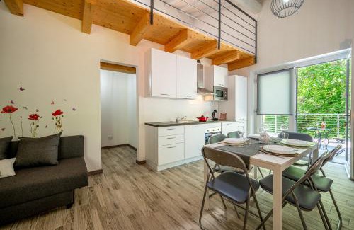 Montemezzo Apartamento | Tenuta il Sogno Ferienwohnung Bianco