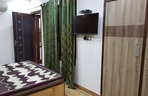 Mukherjee Nagar Casa | Terraza Garden Room ... Increíble