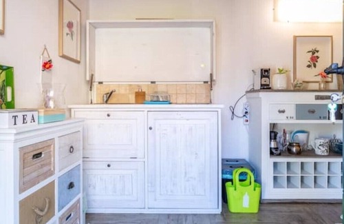 Oggebbio Apartamento | Terraced studio on a botanical garden, facing lake Maggiore