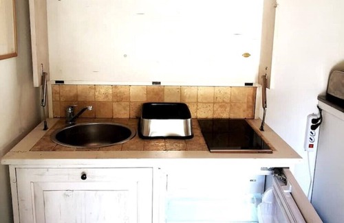 Oggebbio Apartamento | Terraced studio on a botanical garden, facing lake Maggiore