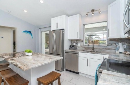 Pinehurst Casa | Terrific 3-bedroom heated pool house near beaches and golf courses!