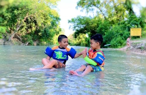 Fentress Otro | Texas Creekside Safari Tent Glamping Perfect for Nature Retreats for Water Sports Enthusiasts