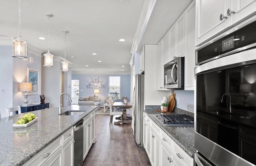 Selbyville Casa | The 10th Tee Retreat - Luxury Bayside 5 Bedroom Home with Golf & Pond Views