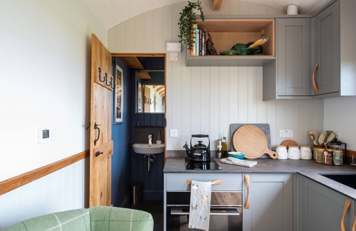 Bridport Cabina | A bespoke handmade oak shepherd's hut, with a delightfully styled interior