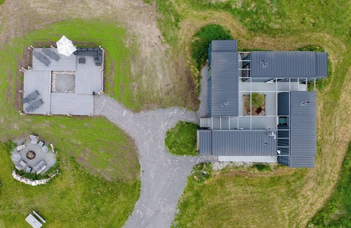 Gilbert Mills Casa | The Acres at High Shore - Shipping Container Suites & Stock Tank Pool