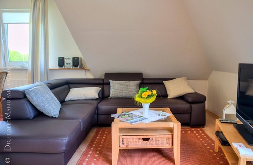Busumer Deichhausen Apartamento | The "balcony room". Great apartment in Büsumer Deichhausen!