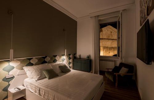 Rione XI Sant'Angelo Apartamento | The Best Rent - Three-Room Apartment with View of the Portico d'Ottavia