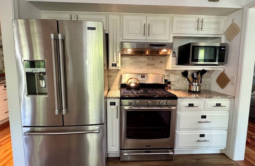 Bryan Casa | The Big Blue House – Spacious Bryan Retreat w/Game Room & Dog-Friendly Yard
