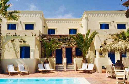 Kamari Hotel | The Boathouse Hotel