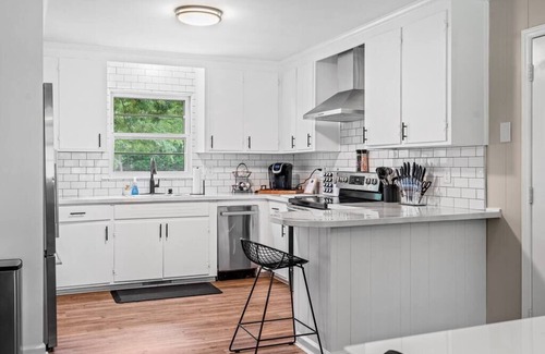 Greensboro Casa | The Boro Bungalow. A Mid-modern home. King beds.