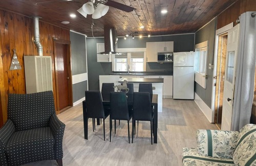 Selwyn Casa | The Canadiana - Rustic Beachfront Cottage