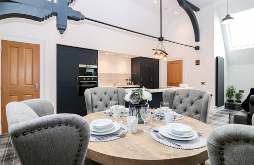 Keith Cabaña | THE CLOCK TOWER AT THE INSTITUTE EXECUTIVE APARTMENTS in Keith