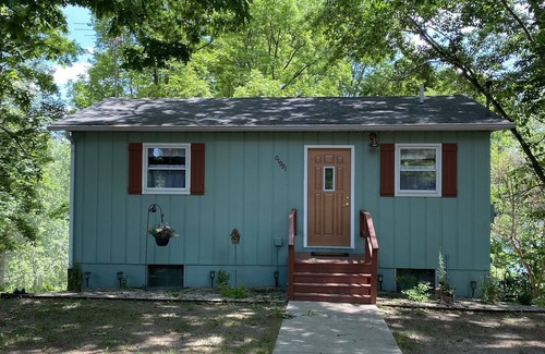 Bloomingdale Casa | The Copper Cottage. Bloomingdale, MI on AllSports Muskrat lake. 1800 sqft home.