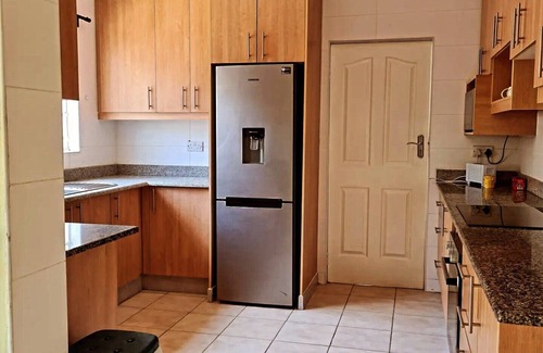 Lilongwe Casa | The Cottage: Fully furnished modern apartment, restful 3 bedrooms