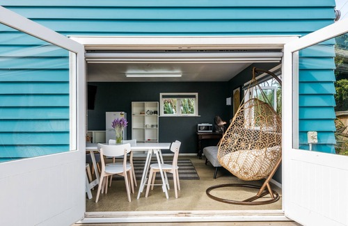 Palm Beach Cabaña | La cabaña en Vista en Hauraki | Sé mi invitado
