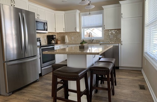 Lake City Casa | The Cottage on Lakeview…Lake Missaukee views…Steps from the beach!