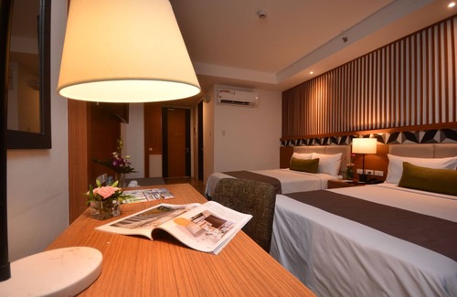 Puerto Princesa Hotel | The Crown Residences at Harbour Springs