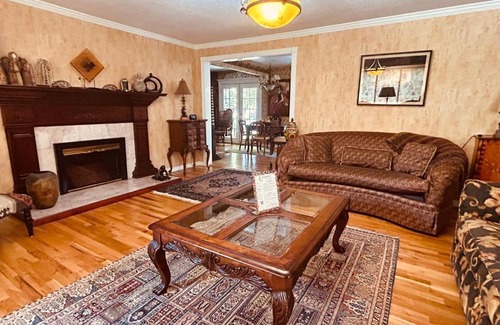 North End Casa | The Doll House an eclectic style of art and old fashioned doll and antique collections in a doll house designed home in Boise's desirable North End across from a nice park with tennis and basement and walking trails near shopping, hiking, biking, skiing