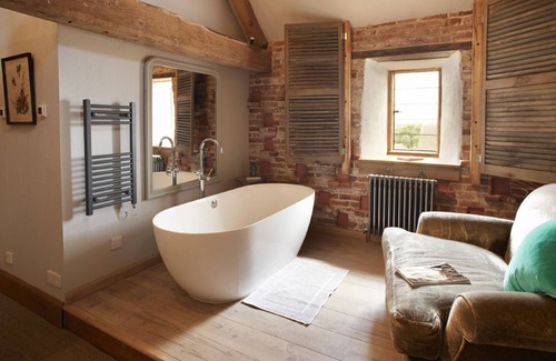 Pauntley Casa | El Dovecote, en los terrenos de Elizabethan Pauntley Court, es la escapada perfecta en el campo.