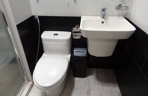 Buhangin Cama Y Desayuno | The Executive Villa Inn & Suites