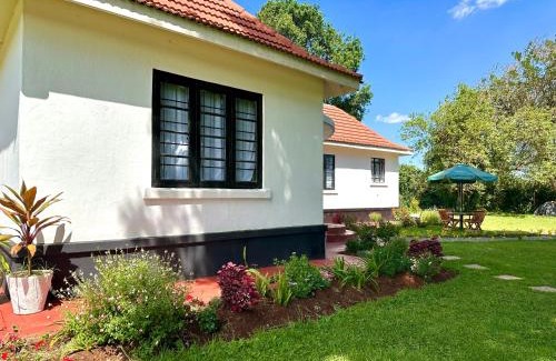 Riara Ridge Casa | The Farmhouse, Tigoni, 1920s home, 85 acre tea farm, outdoor bath & shower
